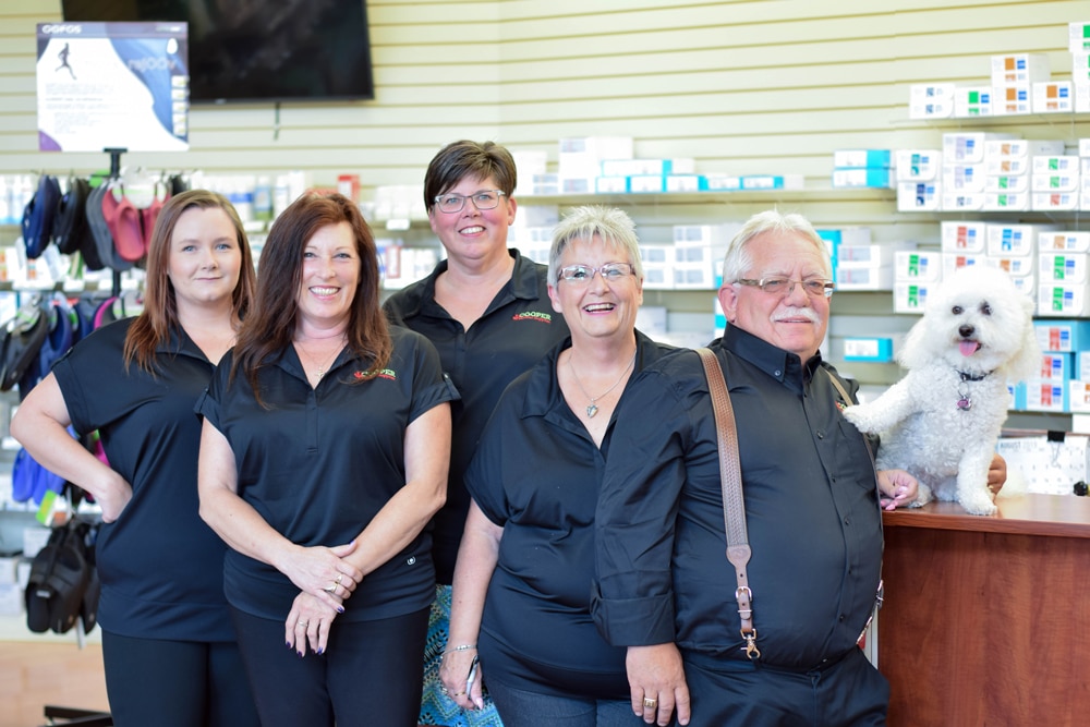 cooper_medical_supplies_kelowna_group_photo_with_dog